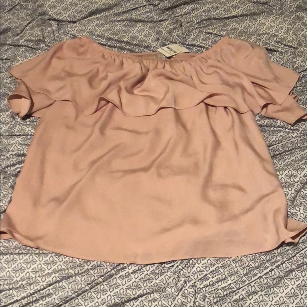 Off the should blush colored blouse